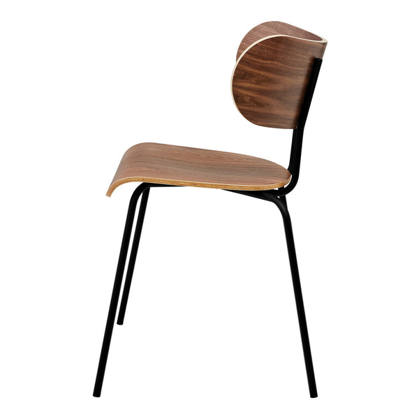 Side view of a modern chair featuring a rich walnut wood seat and backrest, contrasted with sleek black metal legs.