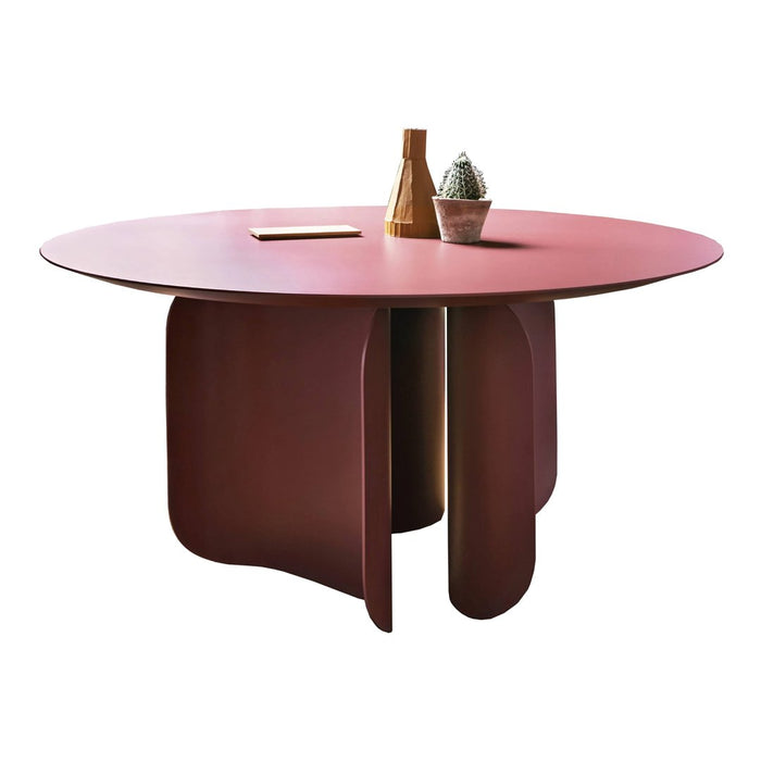 Round table in deep burgundy with smooth finish and curved base, perfect for modern dining spaces.