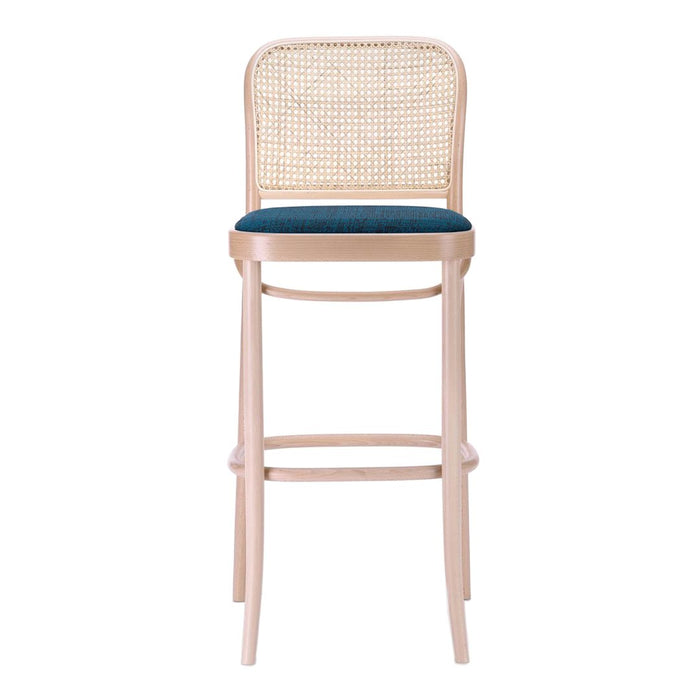 Light wood bar stool with a woven rattan back and teal cushioned seat, showcasing a modern and stylish design.