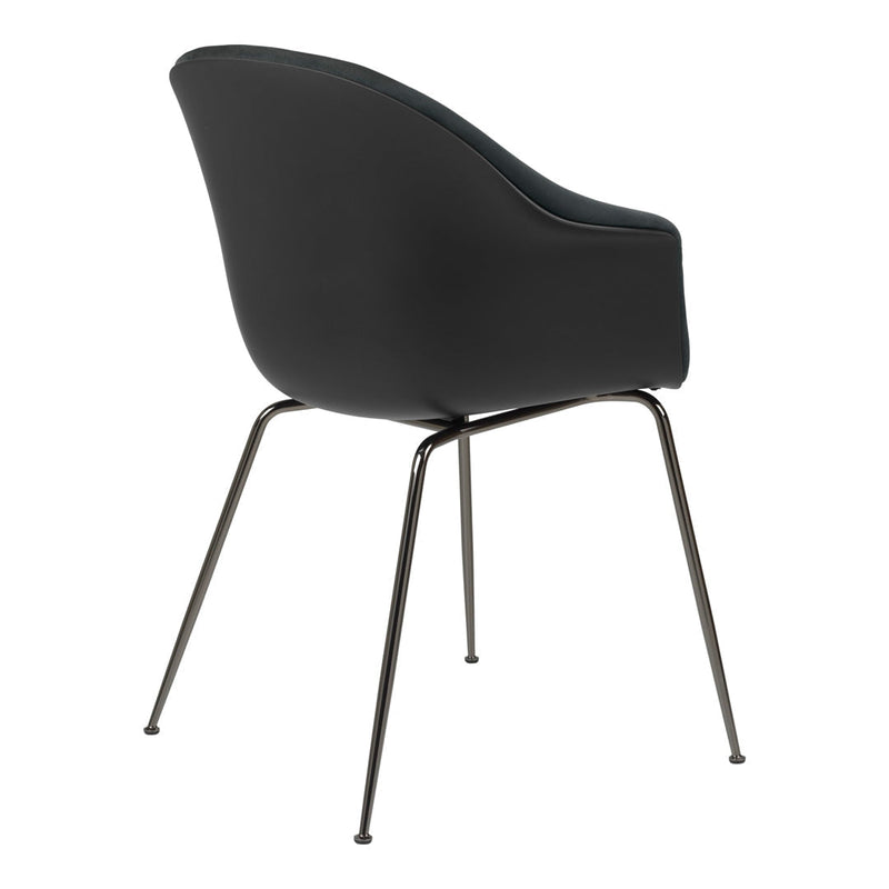 Black upholstered chair with sleek, curved design and metal legs, showcasing a modern, minimalist aesthetic.