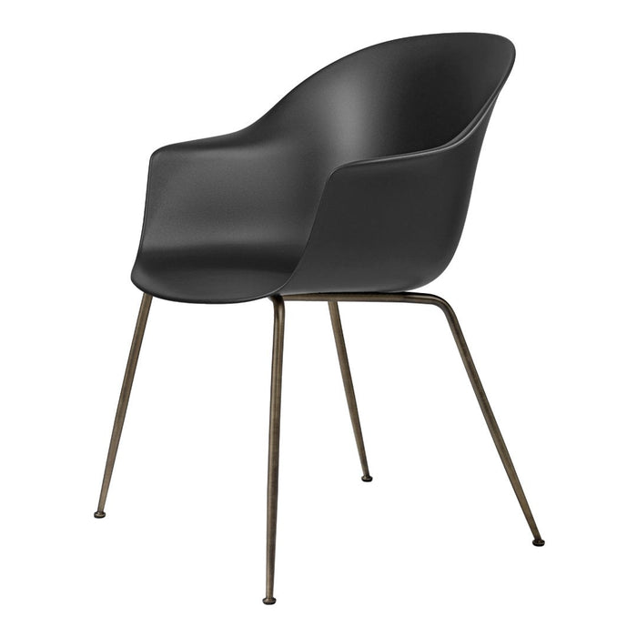 Black armchair with a smooth finish and sleek bronze legs, perfect for modern decor.