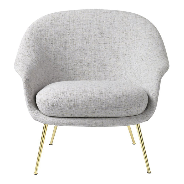 Light gray fabric armchair with a smooth texture and sleek gold legs, perfect for modern decor.