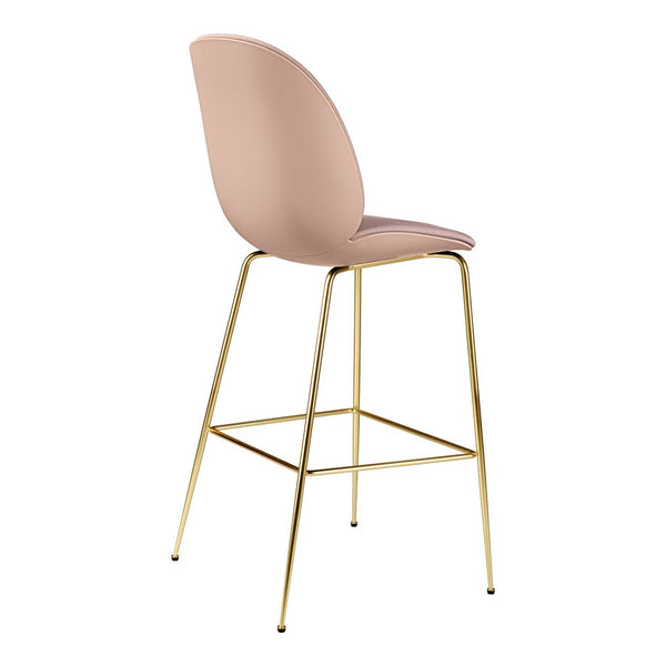 Pink upholstered bar stool with a sleek gold metal frame, featuring a smooth, minimalist design.