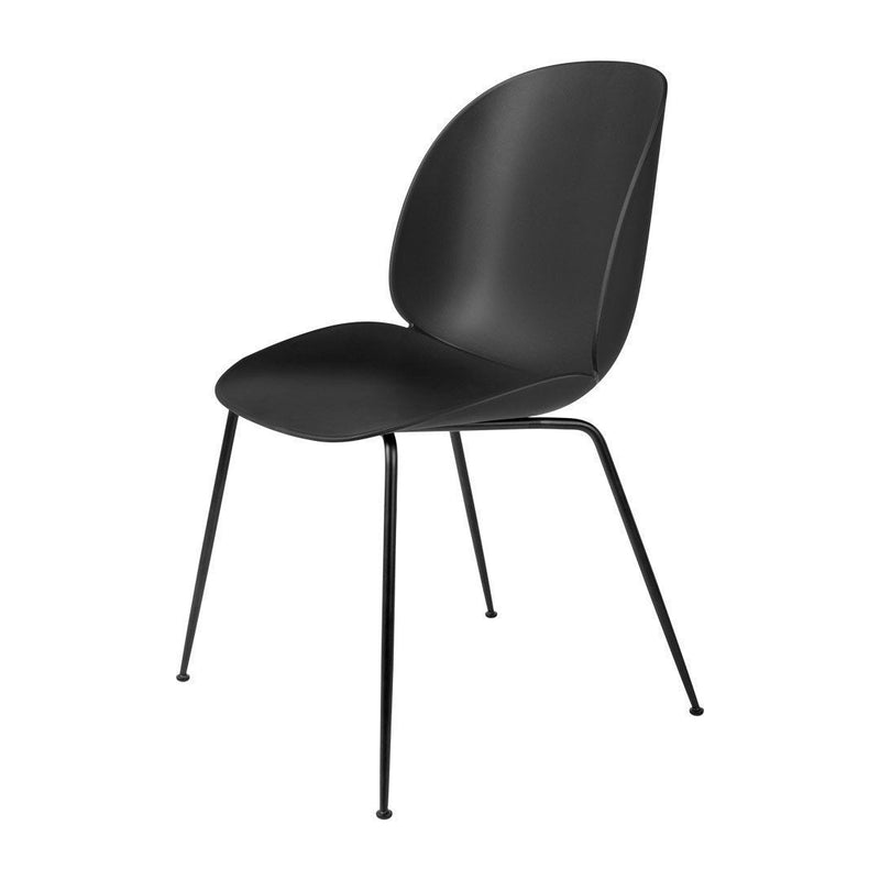 "Modern black chair with a smooth finish and sleek metal legs, featuring a minimalist design for contemporary decor."