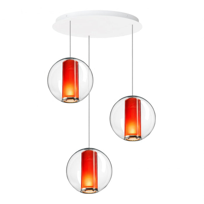 Three pendant lights with sleek glass globes and vibrant orange-red shades, suspended from a white ceiling mount.