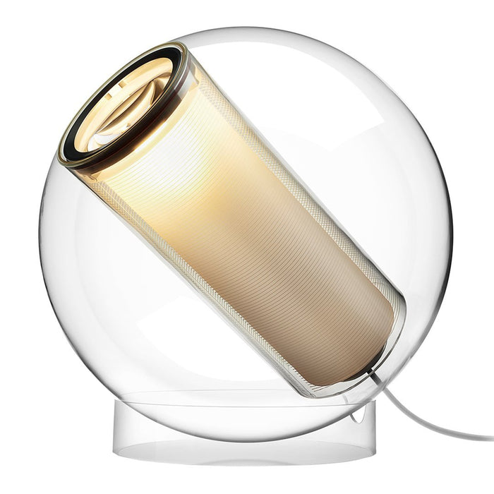 Modern glass lamp featuring a clear spherical base and a warm, cylindrical light fixture with golden accents.