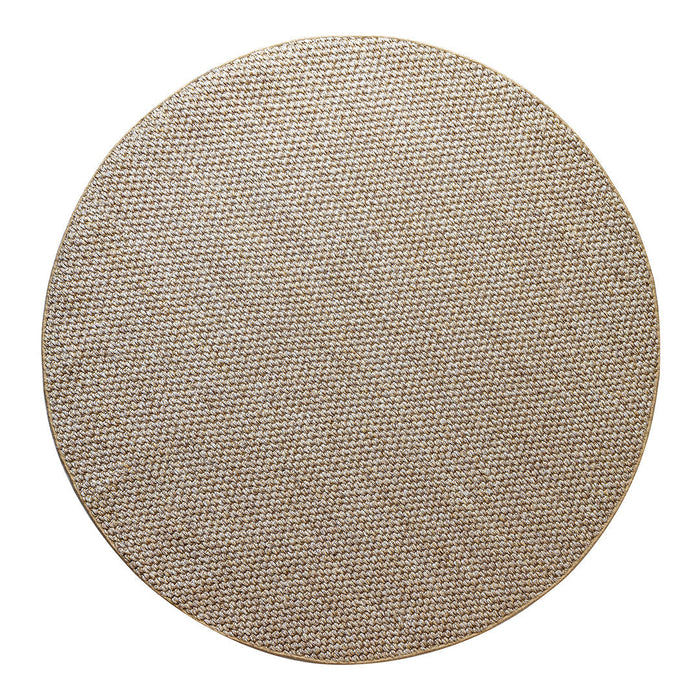 Round placemat in beige with a textured woven pattern, perfect for adding warmth to any dining setting.