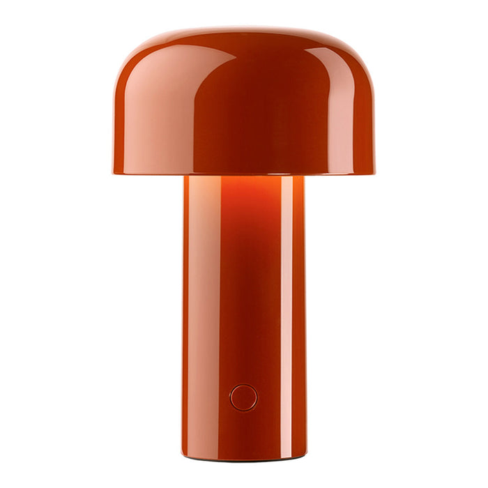 Glossy orange mushroom-shaped lamp with a sleek cylindrical base and smooth, curved lines. Perfect for modern decor.