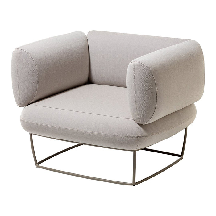 Light gray upholstered chair with smooth, rounded cushions and a minimalist metal base. Simple, modern design.