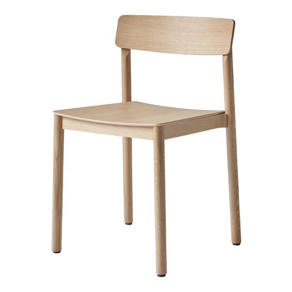 Natural wood chair with a minimalist design, featuring light beige tones and smooth, clean lines.