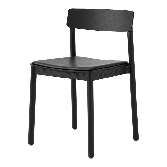 Black wooden chair with a sleek, minimalist design and smooth, matte finish. Perfect for modern decor.