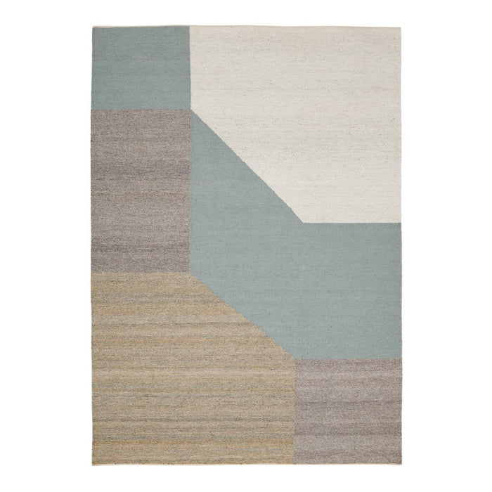 Geometric area rug featuring soft blue, beige, and cream color blocks with textured patterns. Perfect for modern decor.