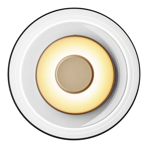 Round ceiling light with a glossy white finish, gold center, and soft, warm white glow. Modern and minimalist design.
