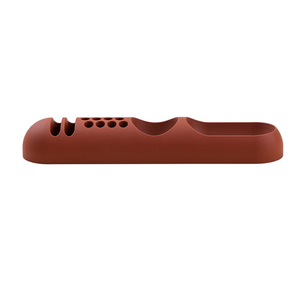 Terra cotta silicone product with smooth finish and subtle ridges, perfect for modern kitchen aesthetics.