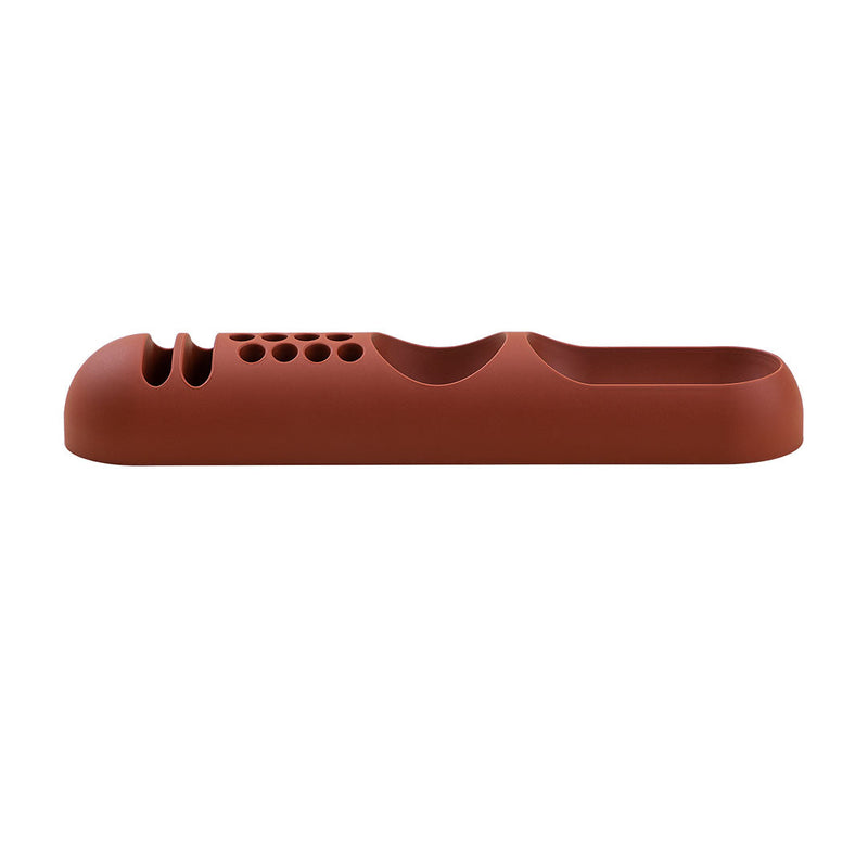 Terra cotta silicone product with smooth finish and subtle ridges, perfect for modern kitchen aesthetics.