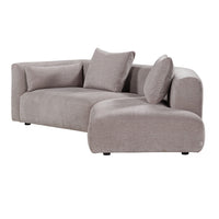Plush gray sectional sofa with smooth fabric and a modern, minimalist design featuring round cushions.