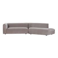 Gray sectional sofa with smooth, modern upholstery and minimalistic design, featuring soft, contemporary lines.