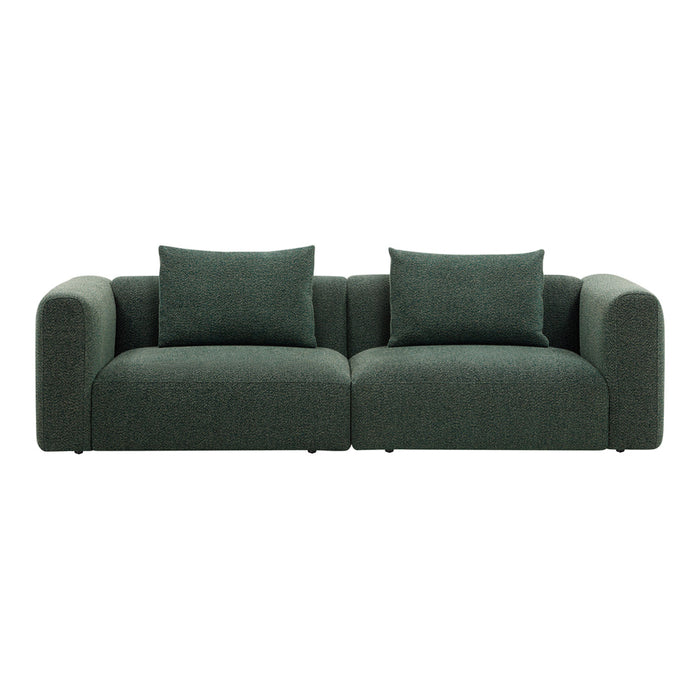 Stylish dark green sofa with plush cushions and a modern, minimalist design. Perfect for contemporary living spaces.