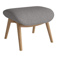Gray upholstered ottoman with smooth texture and natural wood legs, featuring a minimalist design. Perfect for modern decor.