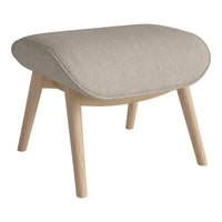 Light beige upholstered ottoman with a smooth texture and natural wood legs. Modern, minimalist design in soft hues.
