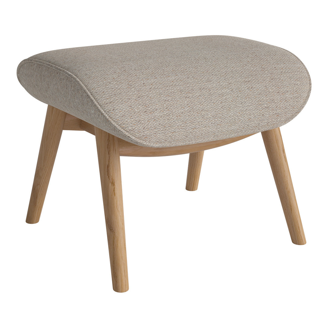 Beige fabric ottoman with soft texture, featuring light wood legs and a curved design for modern decor.