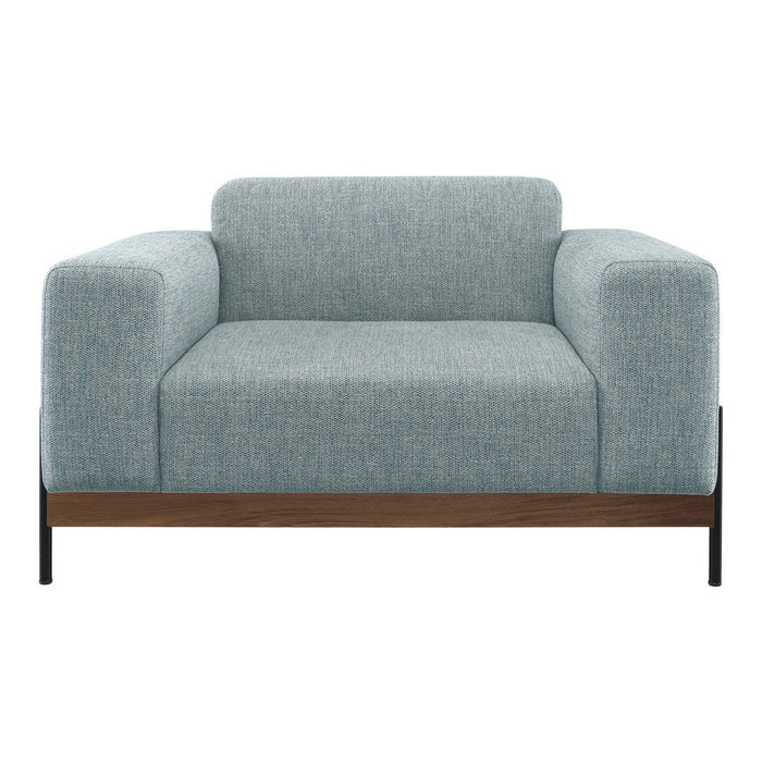 Light blue upholstered armchair with a textured finish and a sleek wooden base. Modern, minimalist design.
