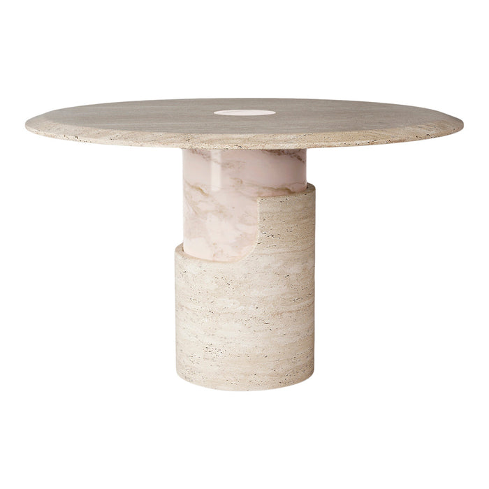 Round marble table with a beige top and pink cylindrical base, showcasing subtle natural patterns.