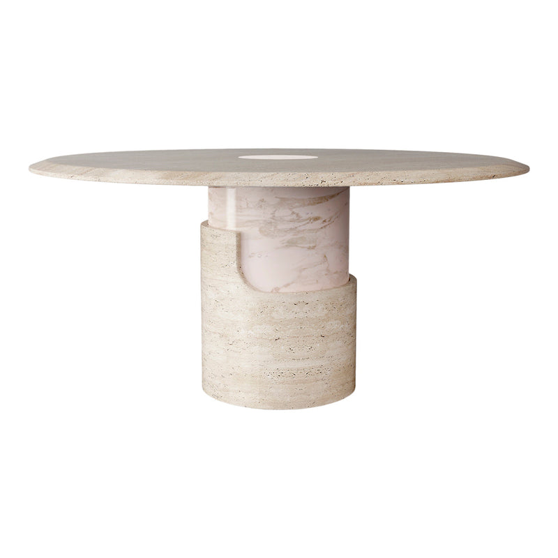 Round marble dining table with a textured beige finish and a smooth light pink base. Elegant and modern design.