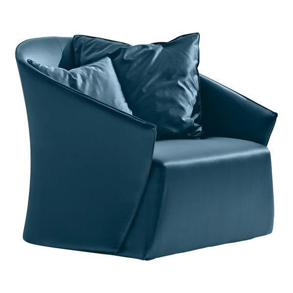 Elegant teal chair with smooth upholstery and plush pillows, featuring a contemporary design and sleek lines.