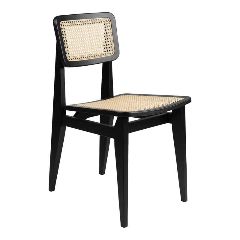Black wooden chair with a woven rattan seat and backrest, showcasing a modern minimalist design.