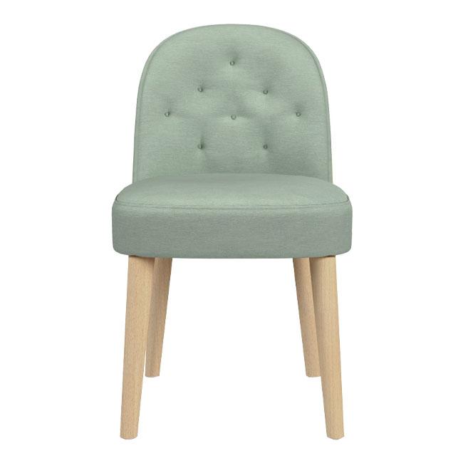 Light green upholstered chair with tufted back and natural wooden legs, adding a soft touch to any decor.