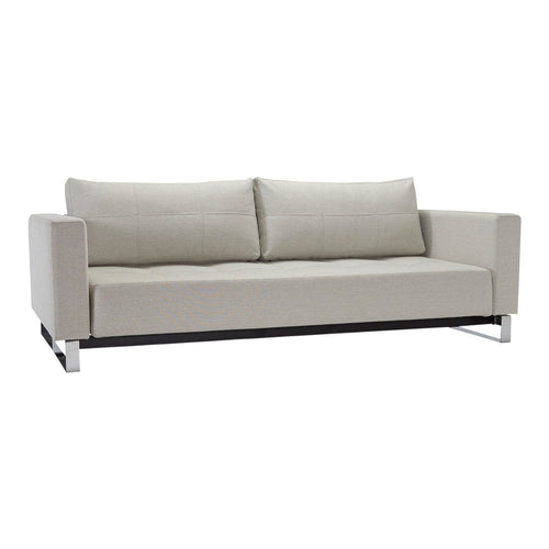 Beige upholstered sofa with sleek lines and chrome legs, featuring a minimalist, modern design.