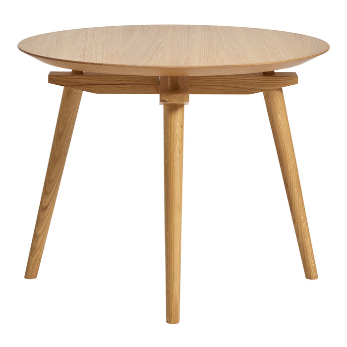 Light oak round table with a smooth wooden surface and slender, tapered legs, perfect for modern minimalist decor.
