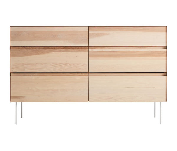 Light natural wood dresser featuring a smooth, minimalist design with horizontal lines and sleek silver legs.