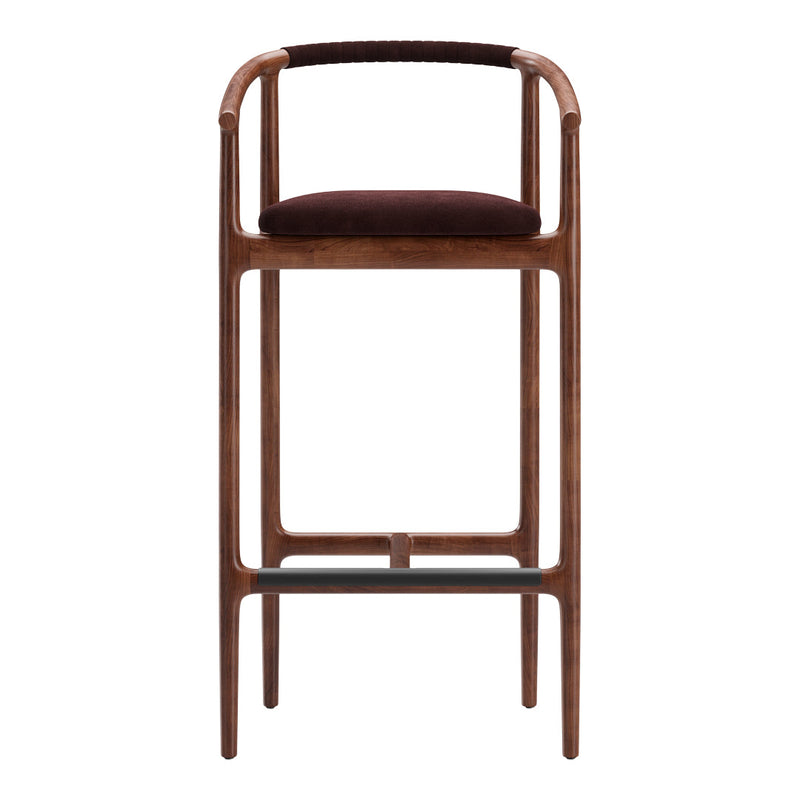 Wooden bar stool in rich walnut color with dark burgundy velvet seat and black padded footrest. Sleek, modern design.