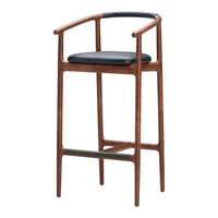 Mid-century wooden bar stool with a rich walnut finish and black leather seat, featuring a textured black grip.