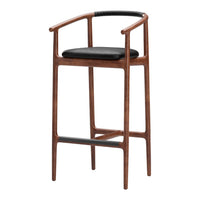 "Wooden bar stool in rich walnut with black leather seat and woven black backrest."