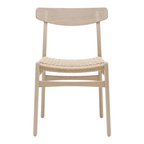 Natural wood finish chair with woven seat, showcasing a minimalist design in soft beige tones.