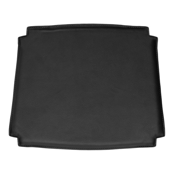 Black rectangular surface with smooth texture and rounded corners, ideal for versatile use in various settings.