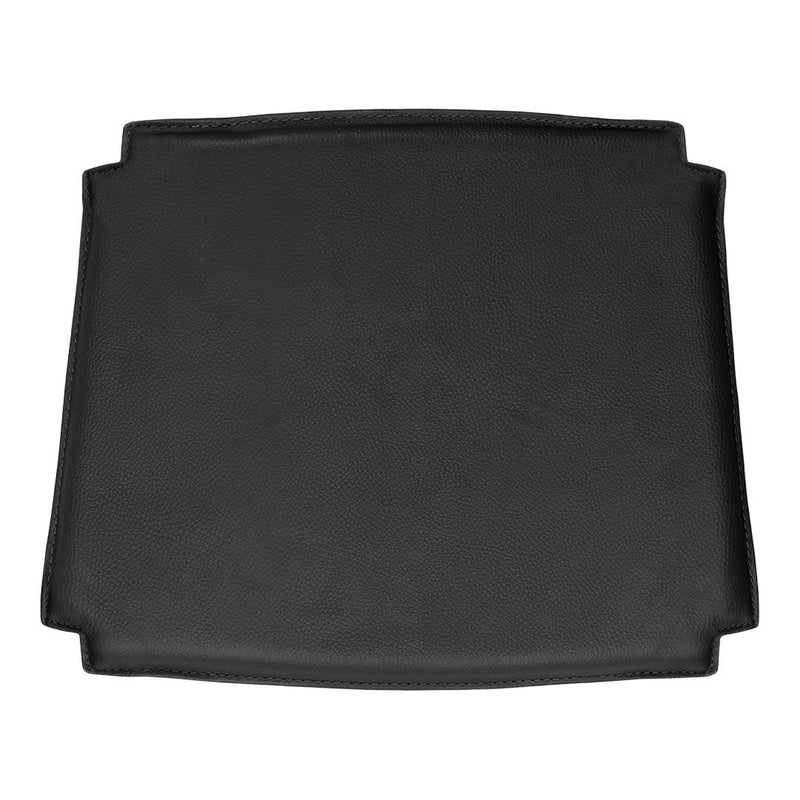 Black rectangular surface with smooth texture and rounded corners, ideal for versatile use in various settings.