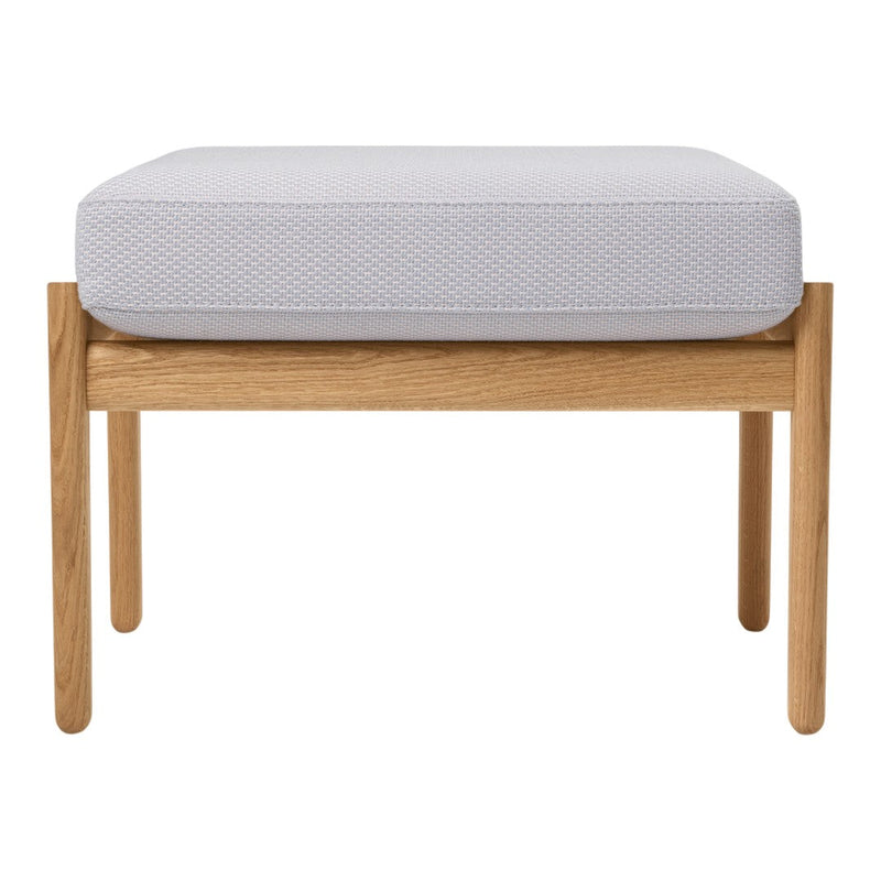 Light gray cushion on natural wood base, featuring a subtle textured pattern. Ideal for modern decor.