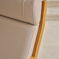 Light beige textured upholstery with a natural wood frame, showcasing a subtle, modern pattern.