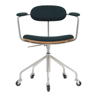 Green upholstered office chair with a sleek chrome base and wooden accents, featuring minimalist design and modern style.