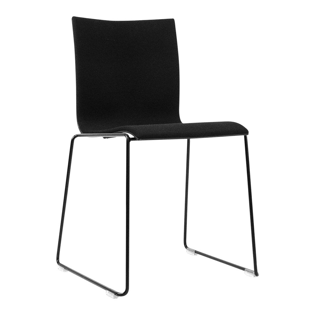 Black minimalist chair with a smooth surface and sleek metal frame, perfect for modern decor.
