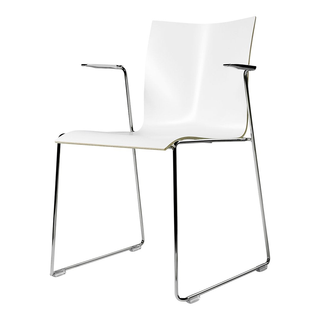 Modern white chair with sleek chrome legs and minimalist design, showcasing a clean, elegant aesthetic.