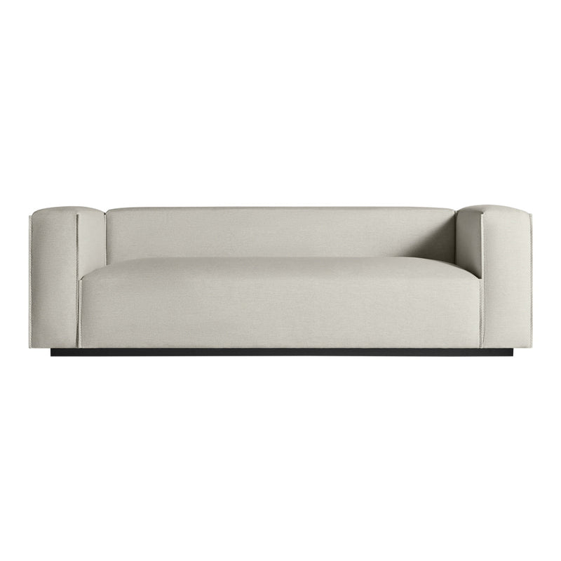Light gray modern sofa with minimalist design and smooth upholstery, featuring clean lines and no visible patterns.