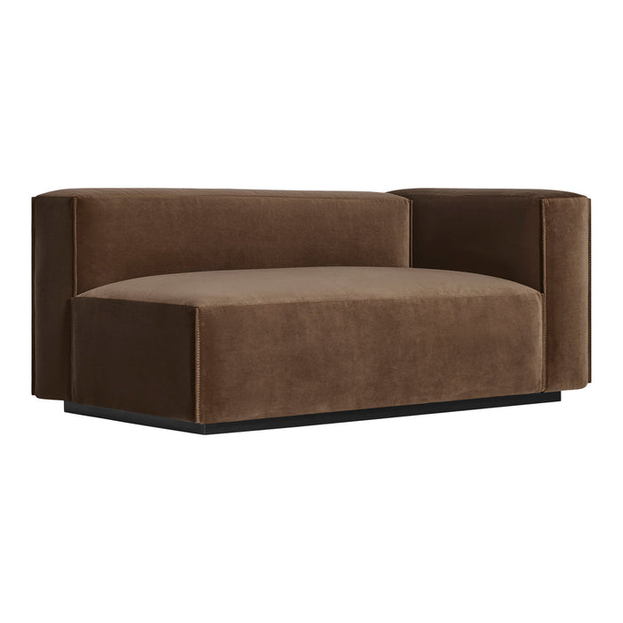 Brown velvet modular sofa with smooth, minimalist design and rounded edges, perfect for modern decor.