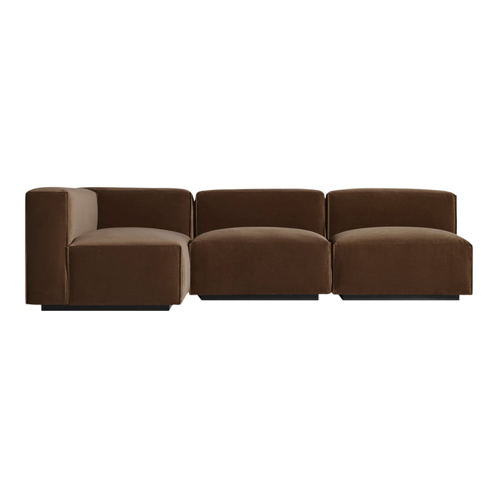 Brown velvet sofa with sleek, modern lines and a minimalist design. Perfect for contemporary living spaces.