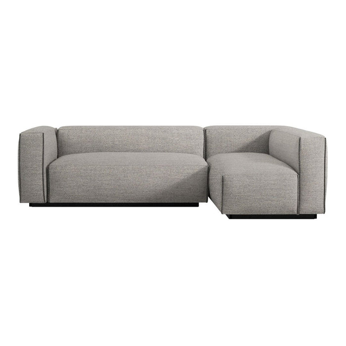 Gray sectional sofa with a sleek, modern design and textured fabric, featuring a minimalist pattern and clean lines.