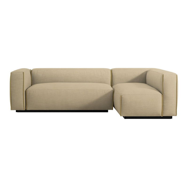 Beige tufted sectional sofa with minimalistic design and clean lines, perfect for modern living spaces.